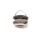 Handbag with floral interior on a white background