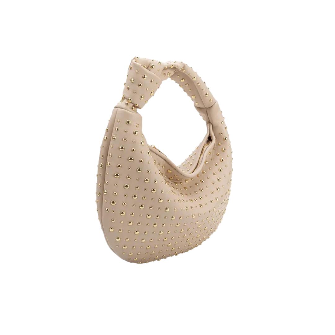 Beige handbag with studded details on a white background