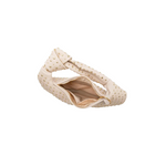 Beige sandal with polka dot pattern on a white background