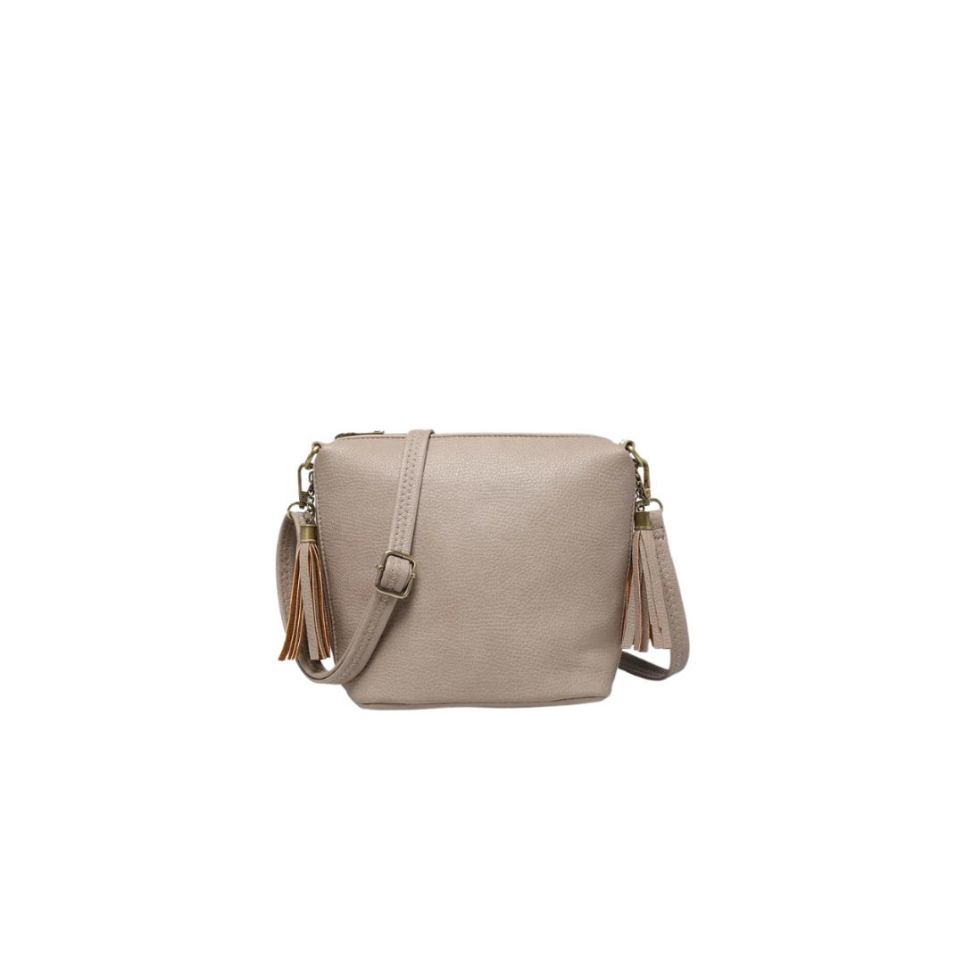 Beige handbag with brown straps on a white background