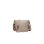 Beige handbag with brown straps on a white background