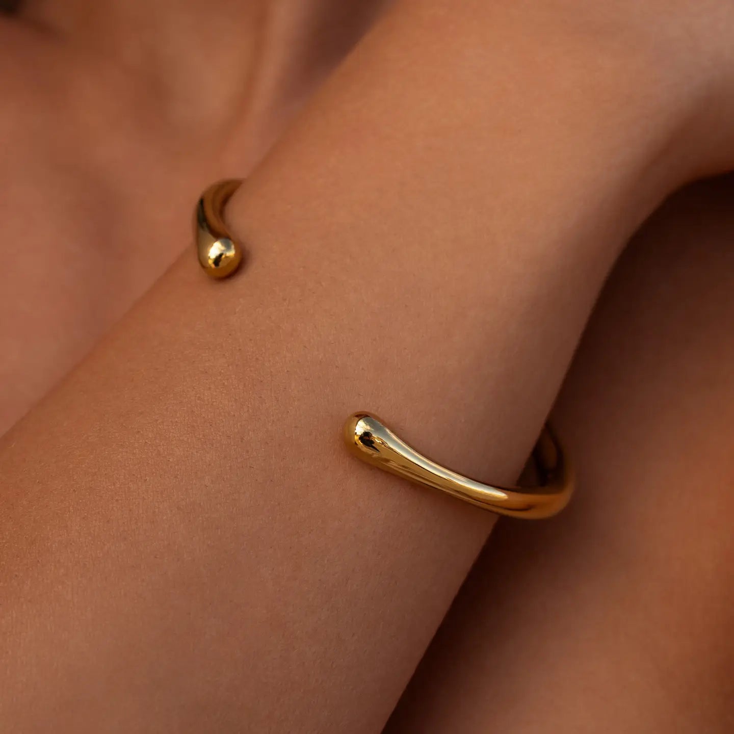 Silver form cuff bracelet by ALCO featuring a sleek, modern design with smooth curves and a polished finish.