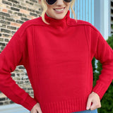 Reverse Hem Red Mock Neck Sweater