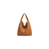 Brown woven handbag on a white background