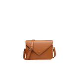 Brown leather handbag on a white background