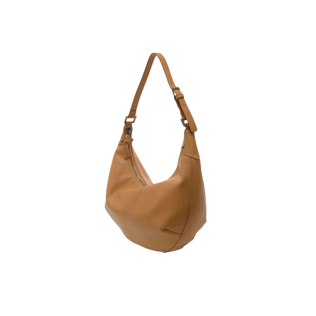 Tan leather handbag with a strap on a white background