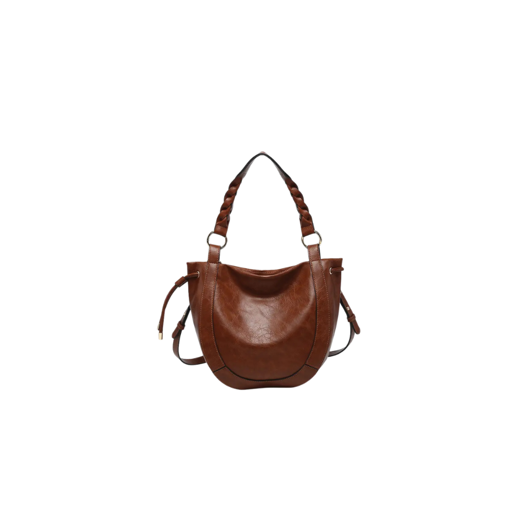 Brown leather handbag on a white background