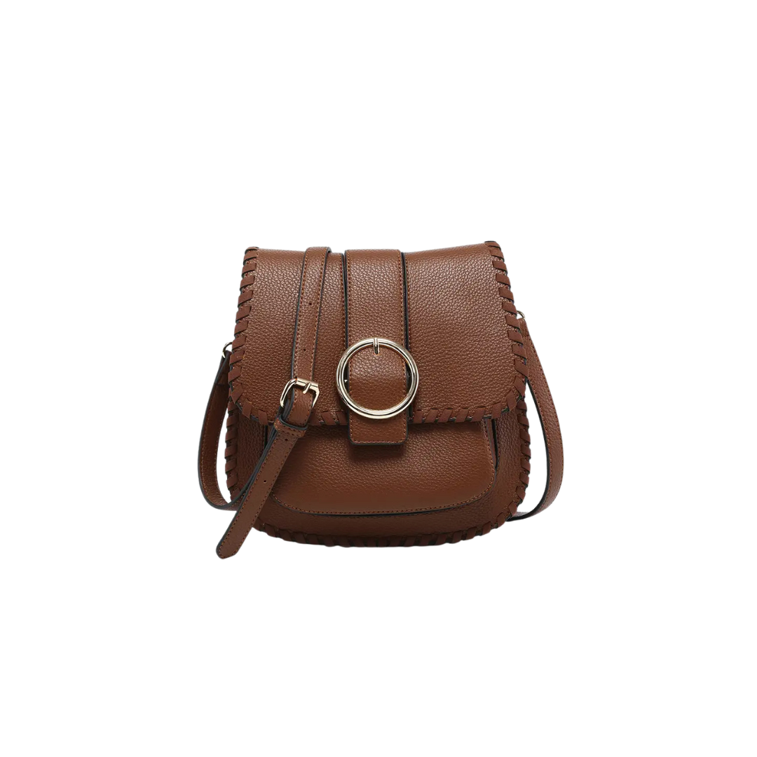 Brown leather handbag with a circular buckle on a white background