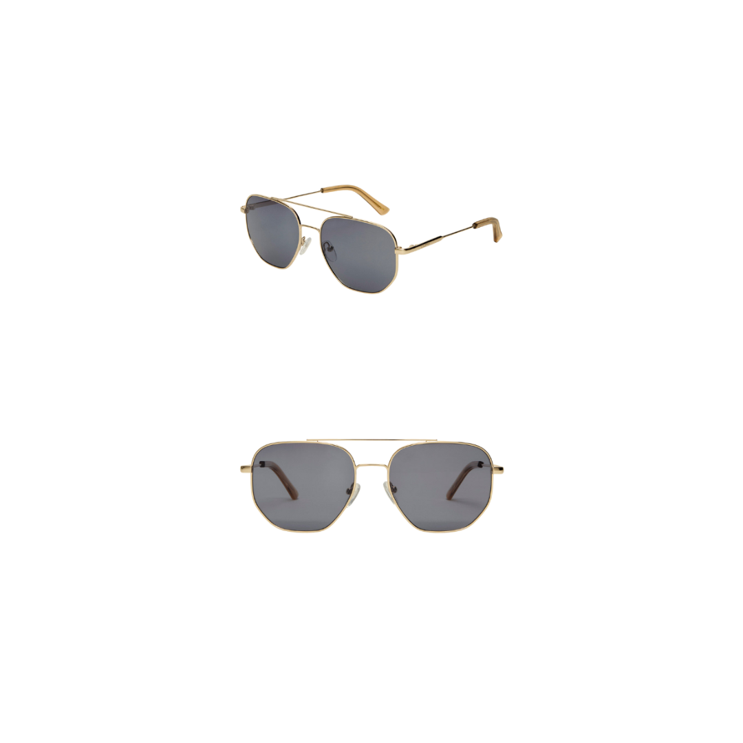 Pair of sunglasses with gold frames and dark lenses on a white background