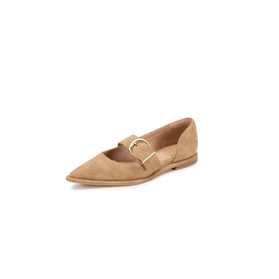 Tan flat shoe with a gold buckle on a white background