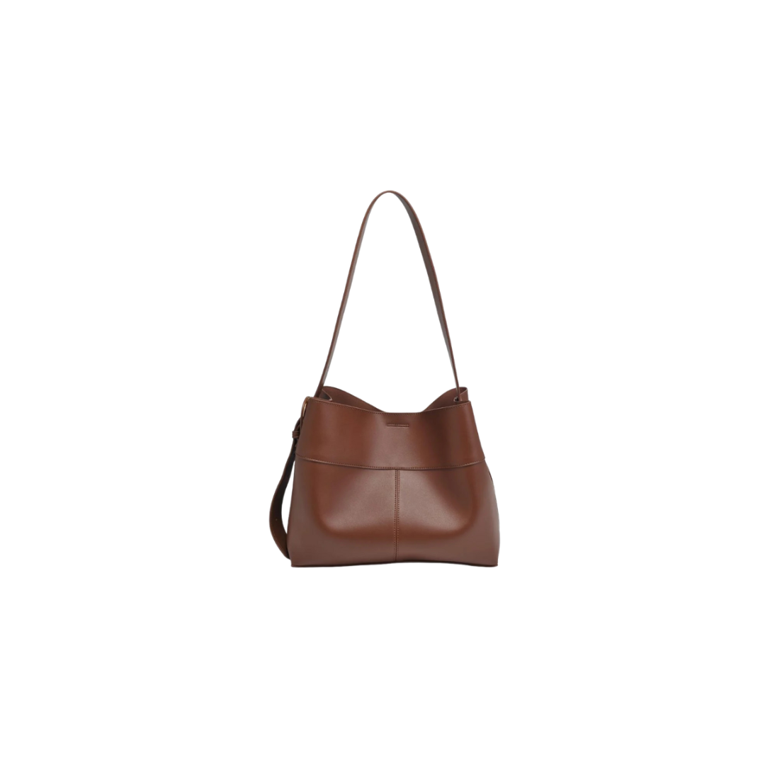 Brown leather handbag on a white background