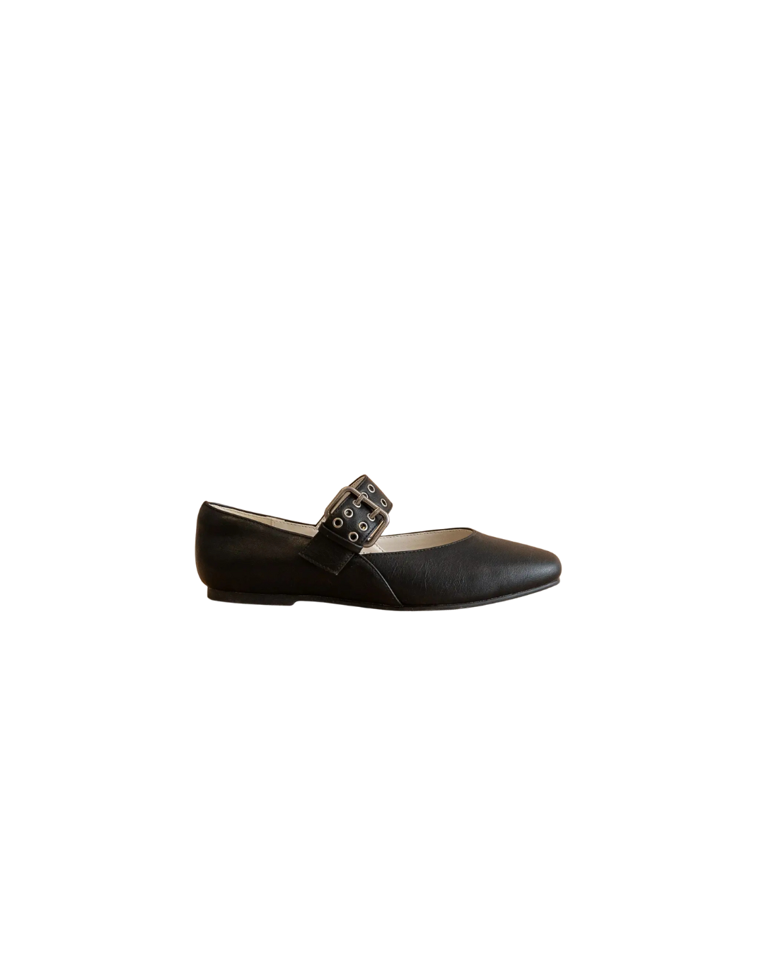 Black flat shoe with a strap on a white background