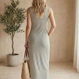 Striped sleeveless boat neck midi dress by Active Basic, made from rayon blend, shown hanging on a white background.