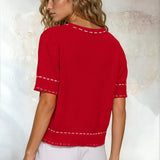 Red and white short sleeve round neck sweater from Active Basic, featuring white stitching, displayed on a neutral background.