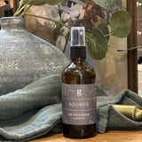 Graced Adored home fragrance air freshener with elegant design, freshening the room with a subtle, inviting scent.