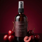 Graced Door County Cherry air freshener for home fragrance, featuring a cherry scent in a sleek container.