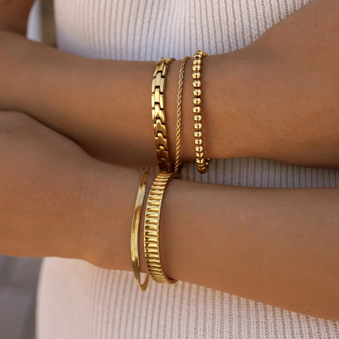 Gold Haven bracelet by ALCO, stylish jewelry accessory featuring a sleek and modern design on a delicate chain.