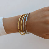 Silver Serenity Bangle Bracelet by ALCO, stylish jewelry accessory with a sleek, minimalist design for everyday wear.