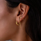 Gold Source Huggies earrings by ALCO, stylish jewelry accessories featuring classic hoop design.