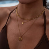 Gold Dawn Necklace by ALCO, a stylish jewelry accessory featuring a delicate chain and elegant pendant design.