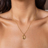Gold Dawn Necklace by ALCO, elegant jewelry accessory featuring a delicate chain and stylish pendant.