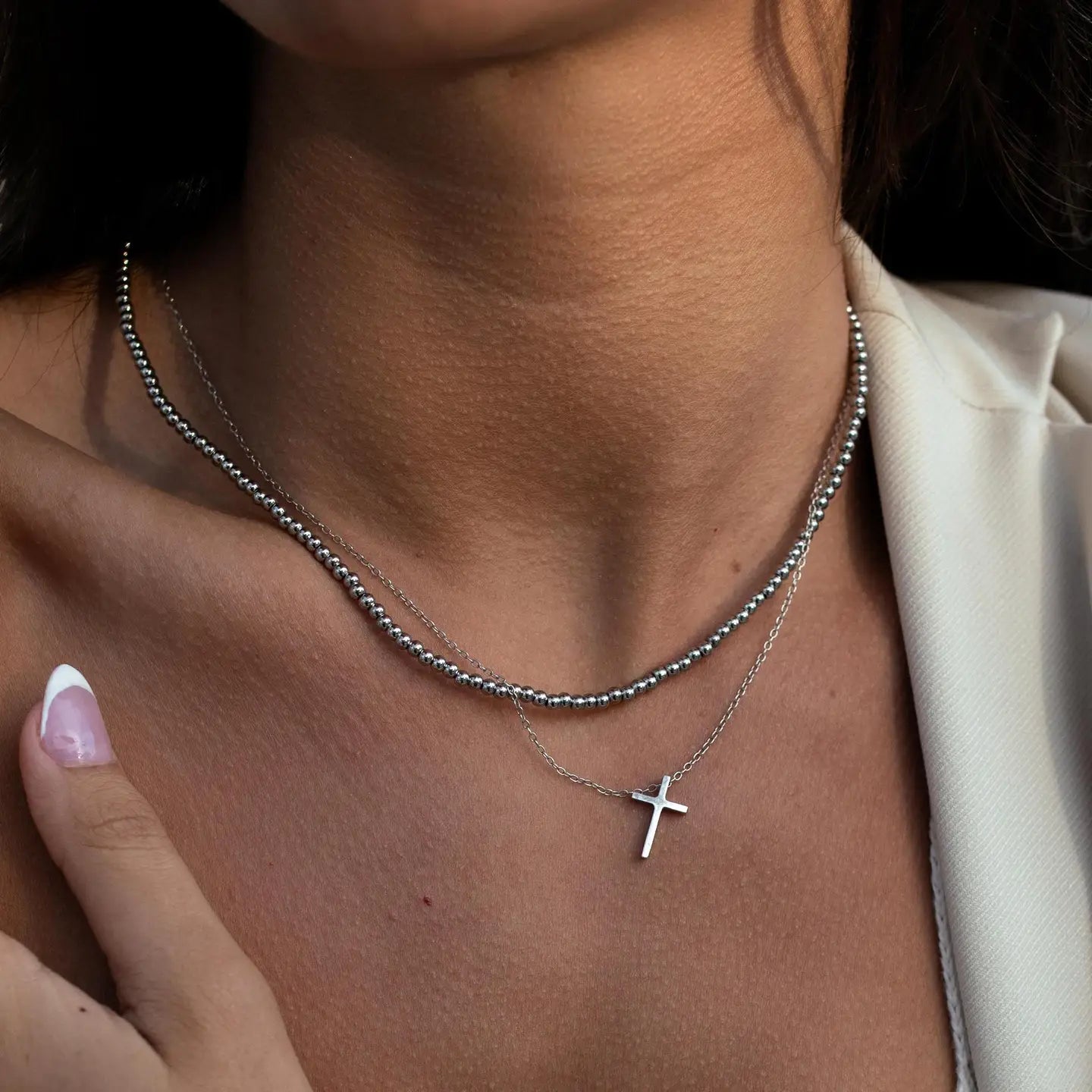 Silver cross necklace by ALCO, a stylish jewelry accessory with a polished silver finish, perfect for everyday or special occasions.