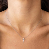 Silver cross necklace by ALCO, a stylish jewelry accessory with detailed pendant featuring a classic cross design.