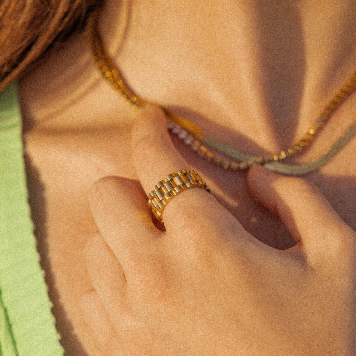 Gold Lineage Ring by ALCO, a stylish jewelry accessory featuring a sleek gold band design.