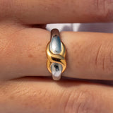 Elegant ALCO Interlace Ring with intertwined metal design, showcasing intricate jewelry craftsmanship.