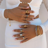 Silver ALCO Interlace Ring, interwoven jewelry ring with intricate design, perfect accessory for stylish outfits.