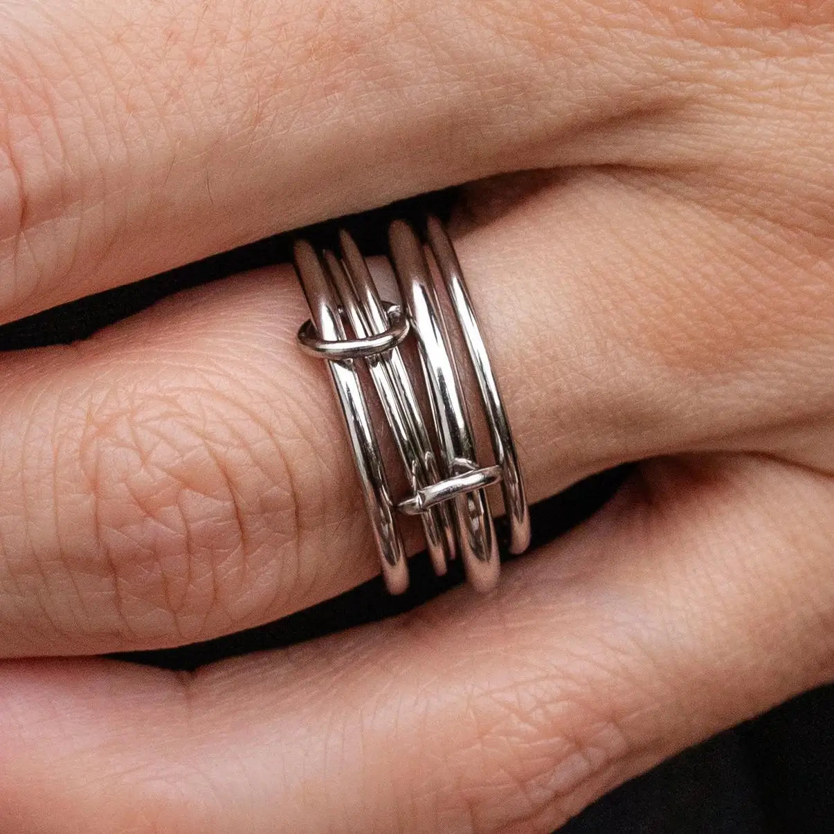 Silver Vault Ring by ALCO, a stylish jewelry accessory featuring a sleek silver band and modern design.
