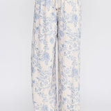 Allie Rose floral linen pants in blue with small blossom print, lightweight bottoms with a relaxed fit and comfortable waistband.