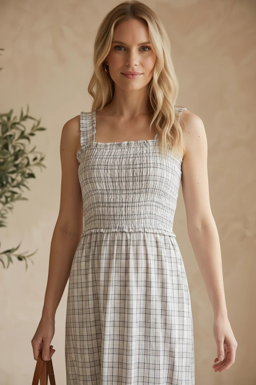 Allie Rose plaid print smocked midi dress in blue with a fitted bodice and flowing skirt, perfect for casual or semi-formal wear.