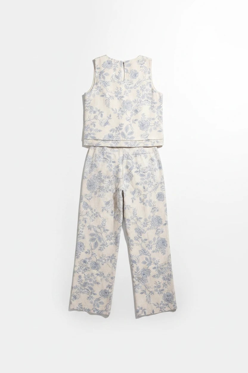 Cream and blue floral linen top by Allie Rose, featuring a lightweight, breathable fabric and a relaxed fit for casual wear.