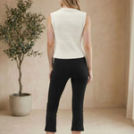 Back view of Be Cool knit button-up sweater vest, featuring a classic design and ribbed detailing on a casual tops- knit style.