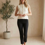 Cream knit button-up sweater vest from Be Cool, featuring a classic fit and ribbed neckline and armholes.