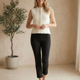 Cream knit button-up sweater vest from Be Cool, featuring a classic fit and ribbed neckline and armholes.