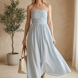 Blue and white striped strapless maxi dress by By Together, made from a soft rayon blend, flowing and elegant for warm weather.
