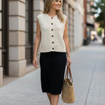 Be Cool cable knit sweater vest, a cozy knit top with a textured cable pattern, perfect for layered winter outfits.