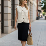 Be Cool cable knit sweater vest, a cozy knit top with a textured cable pattern, perfect for layered winter outfits.
