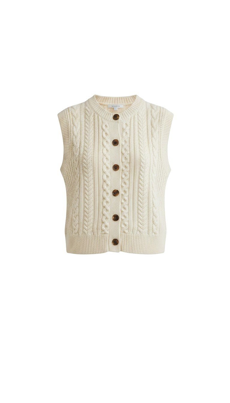 Cream Be Cool cable knit sweater vest, a stylish knit top with textured cable pattern and sleeveless design.