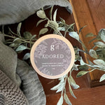 Graced Adored mini scented candle in a simple glass holder, perfect for home fragrance and ambiance.