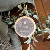Graced Adored mini scented candle in a simple glass holder, perfect for home fragrance and ambiance.