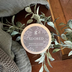 Graced Adored mini scented candle in a simple glass holder, perfect for home fragrance and ambiance.