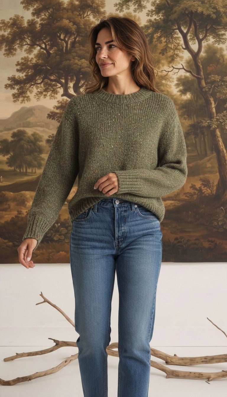graced chunky olive green crewneck sweater with a relaxed knit texture worn with blue jeans