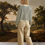 Navy chunky knit striped cardigan by Miou Muse, featuring a cozy, textured sweater with bold horizontal stripes.