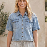 Wishlist Clara Denim Shirt, a casual blue denim top with long sleeves and classic collar, styled on a neutral background.