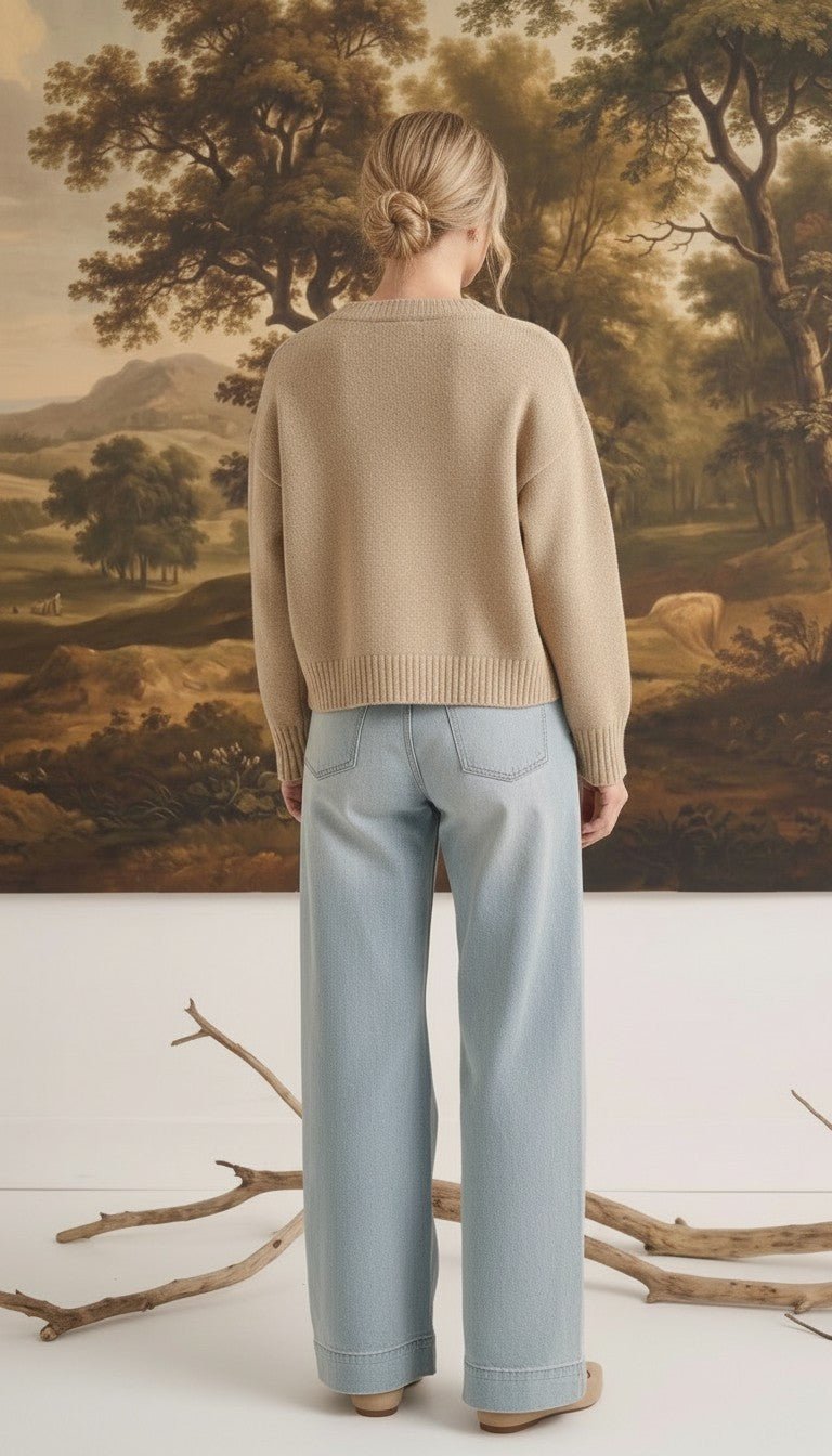 graced mushroom crew neck cardigan worn by a woman with blonde hair in a bun, paired with light wash wide leg jeans