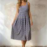 Doe and Rae floral print square neck midi dress with long sleeves, featuring a vibrant floral pattern and elegant fit.