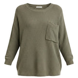 graced forest green dolman long sleeve knit sweater with a waffle texture and a single chest pocket